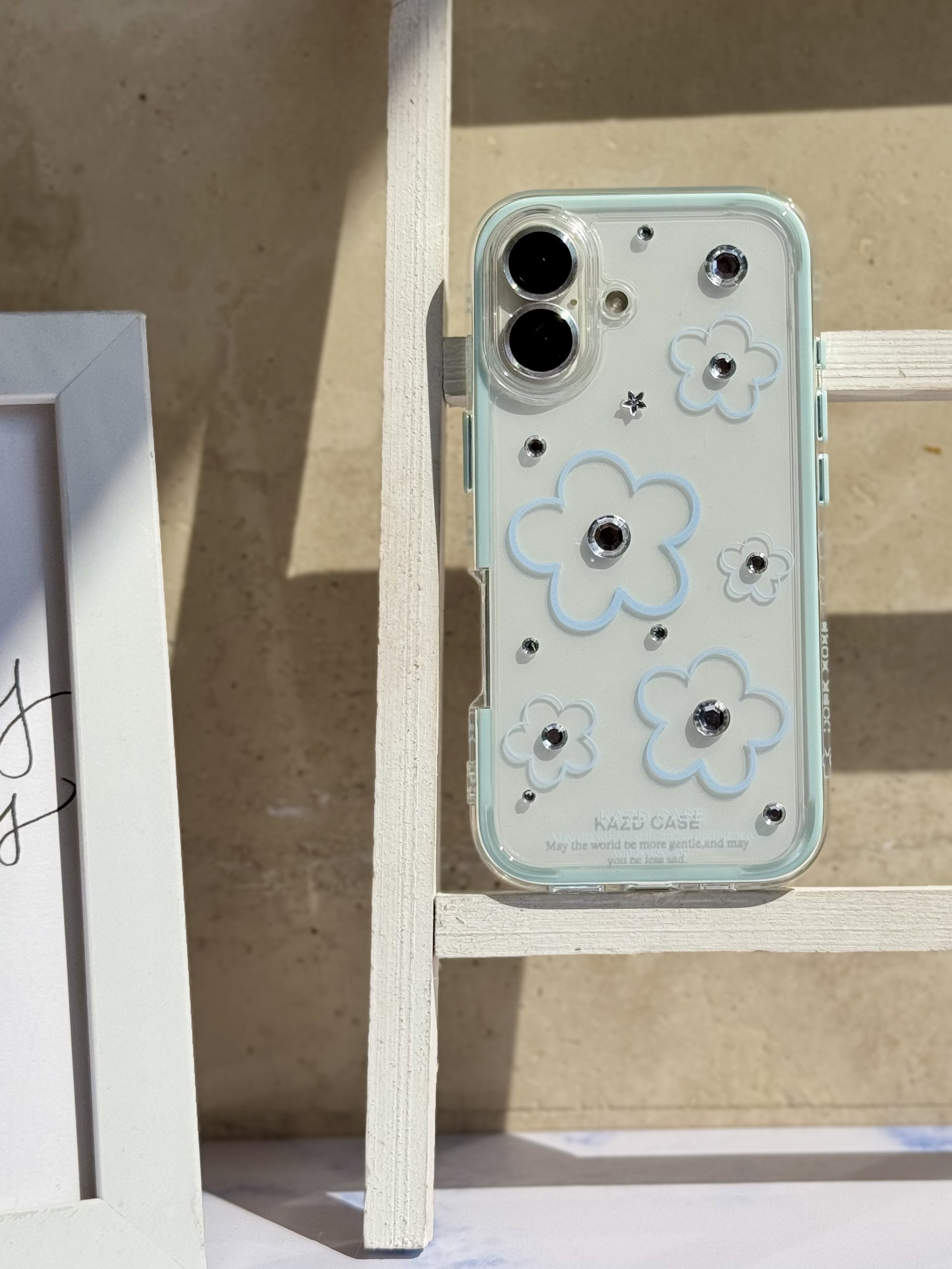 قاب گل آبی نگین دار مناسب برای آیفون | iPhone iphone16promax
